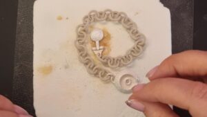 Refiring a clasp with the additional silver clay chain