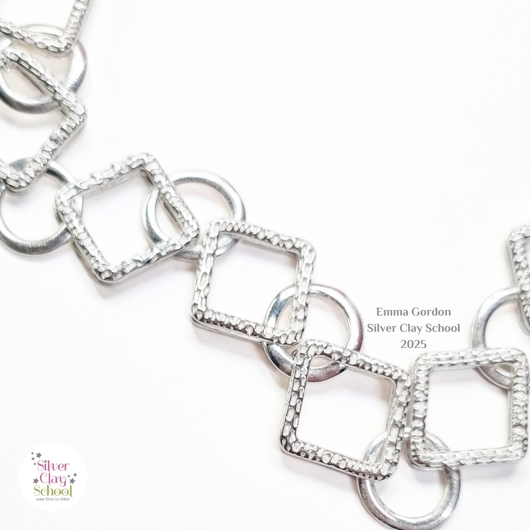 Close up of geometric silver clay chain Close up of geometric silver clay chain