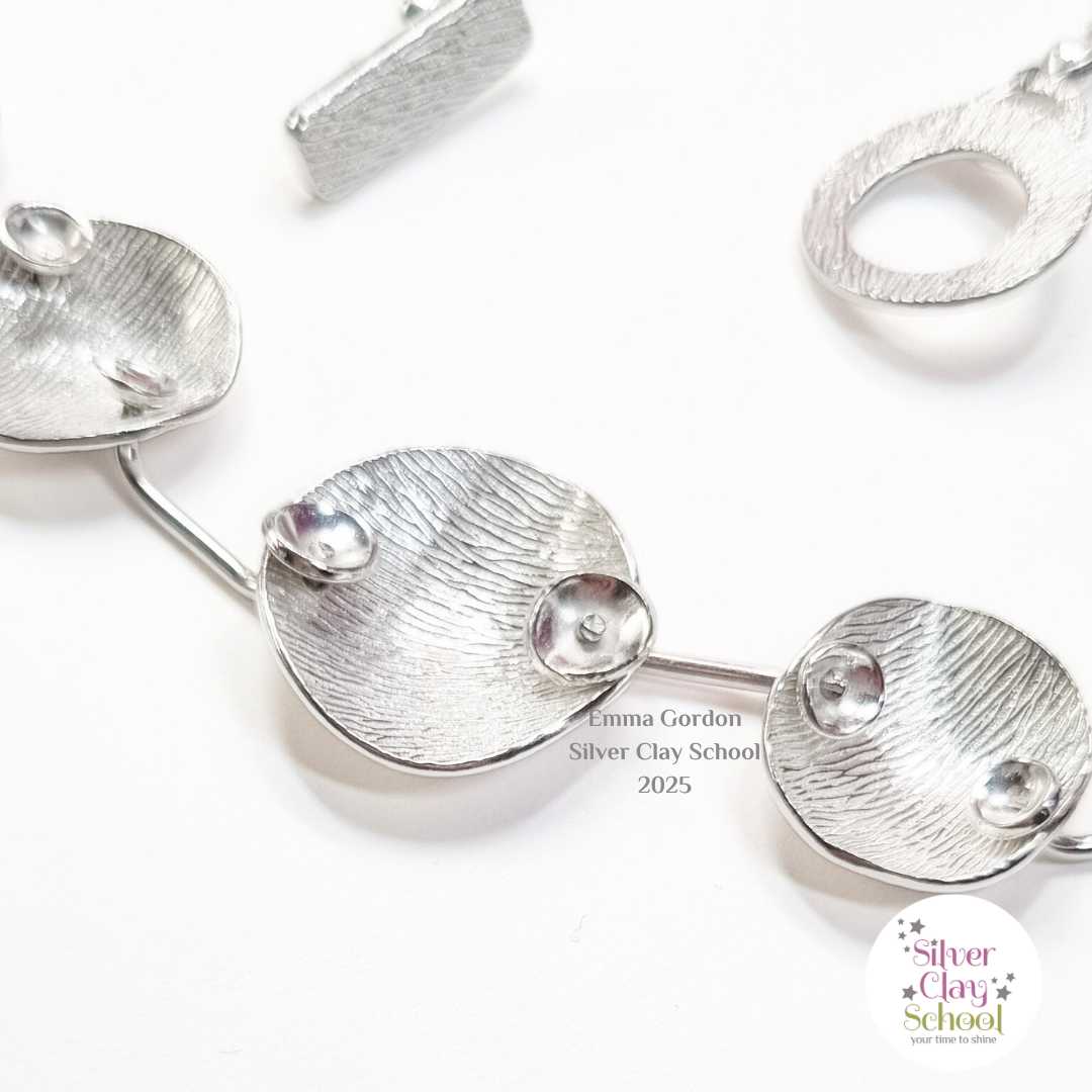 Satellite silver clay chain close up Satellite silver clay chain close up